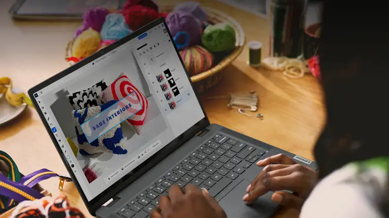A Chromebook shows interior design planning in Adobe Photoshop.
